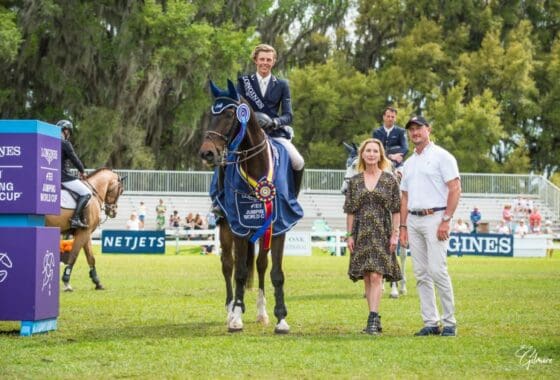 Brian Moggre in Awards Presentation with Weber Family. PC: Erin Gilmore for Live Oak International