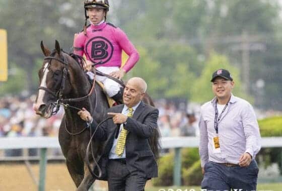 Trainer Mark Casse with War of Will and Jockey Tyler Gaffalione after Preakness Win. PC: Eric Kalet for Paulick Report